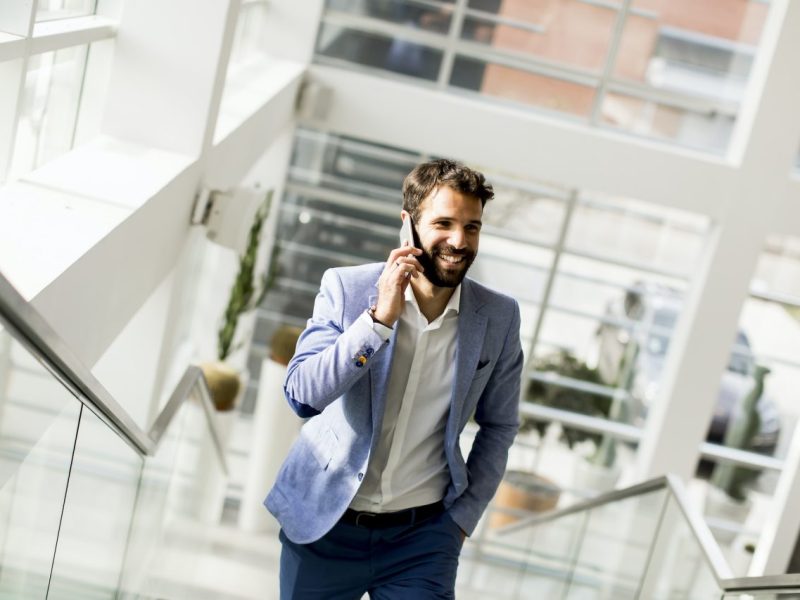handsome-businessman-in-suit-using-the-phone.jpg