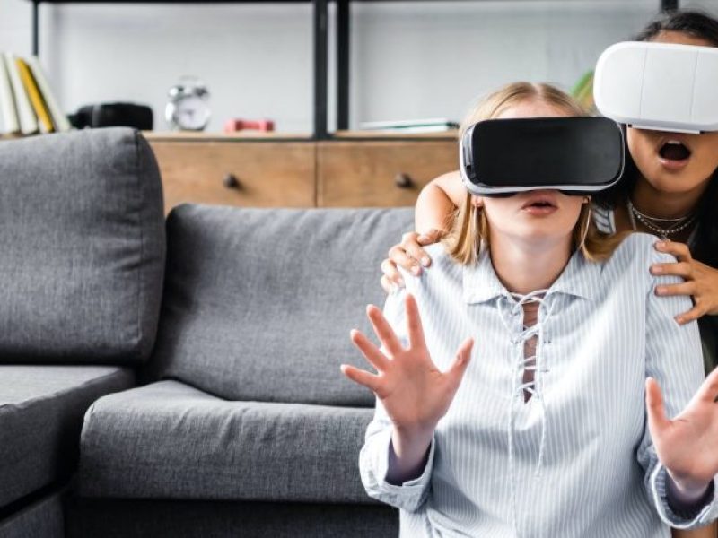 panoramic-shot-of-multicultural-friends-with-virtual-reality-headsets.jpg